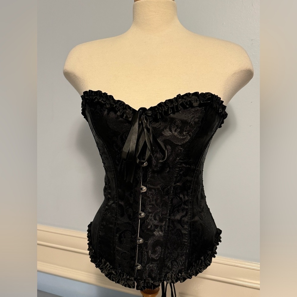 All black ruffled corset